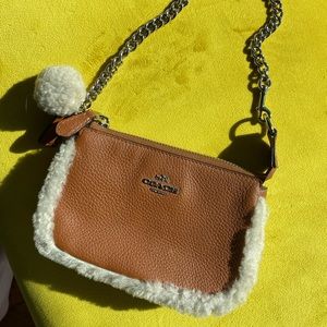 Coach, tan leather wristlet